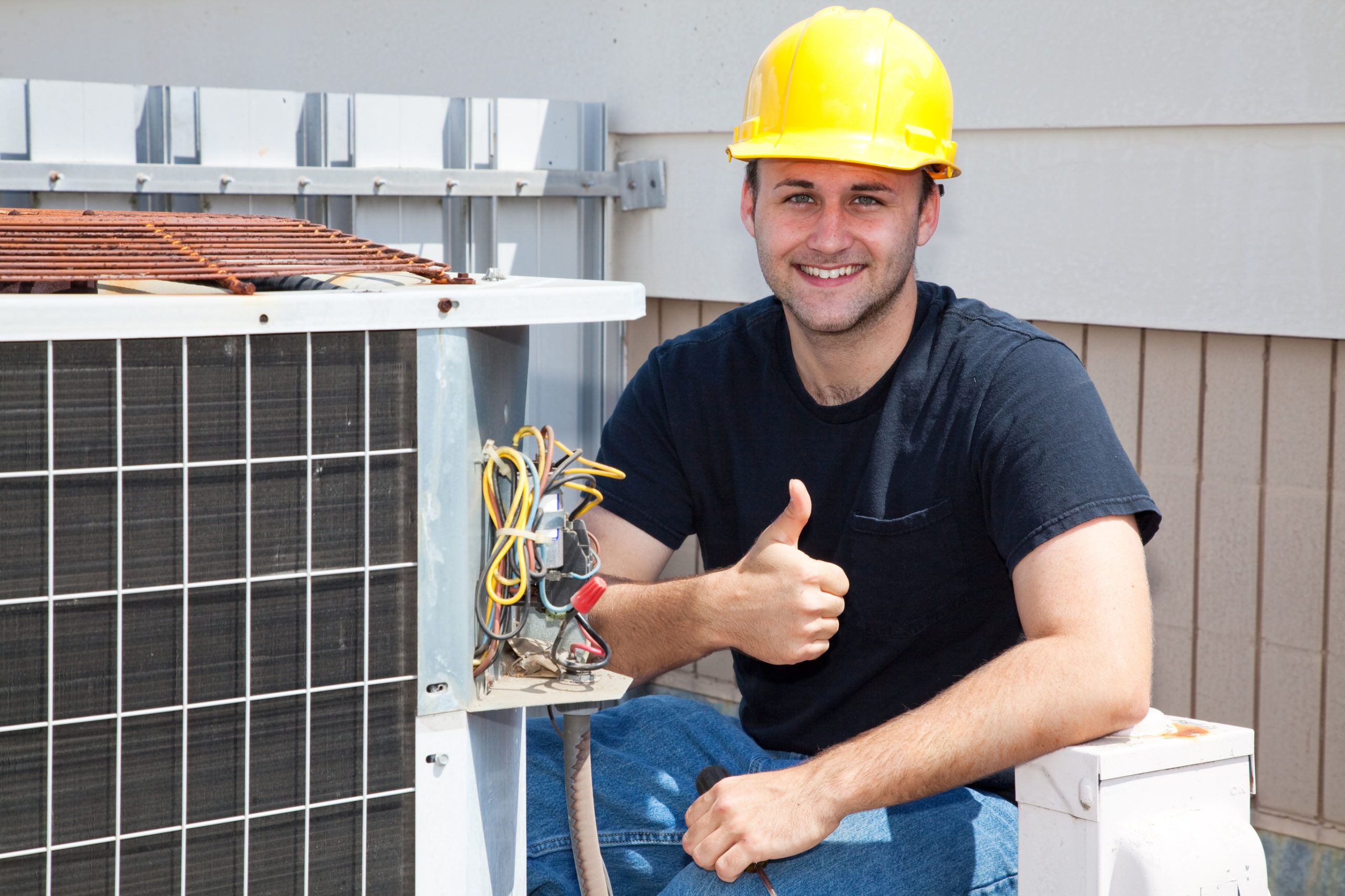 AC repair worker thumbs up